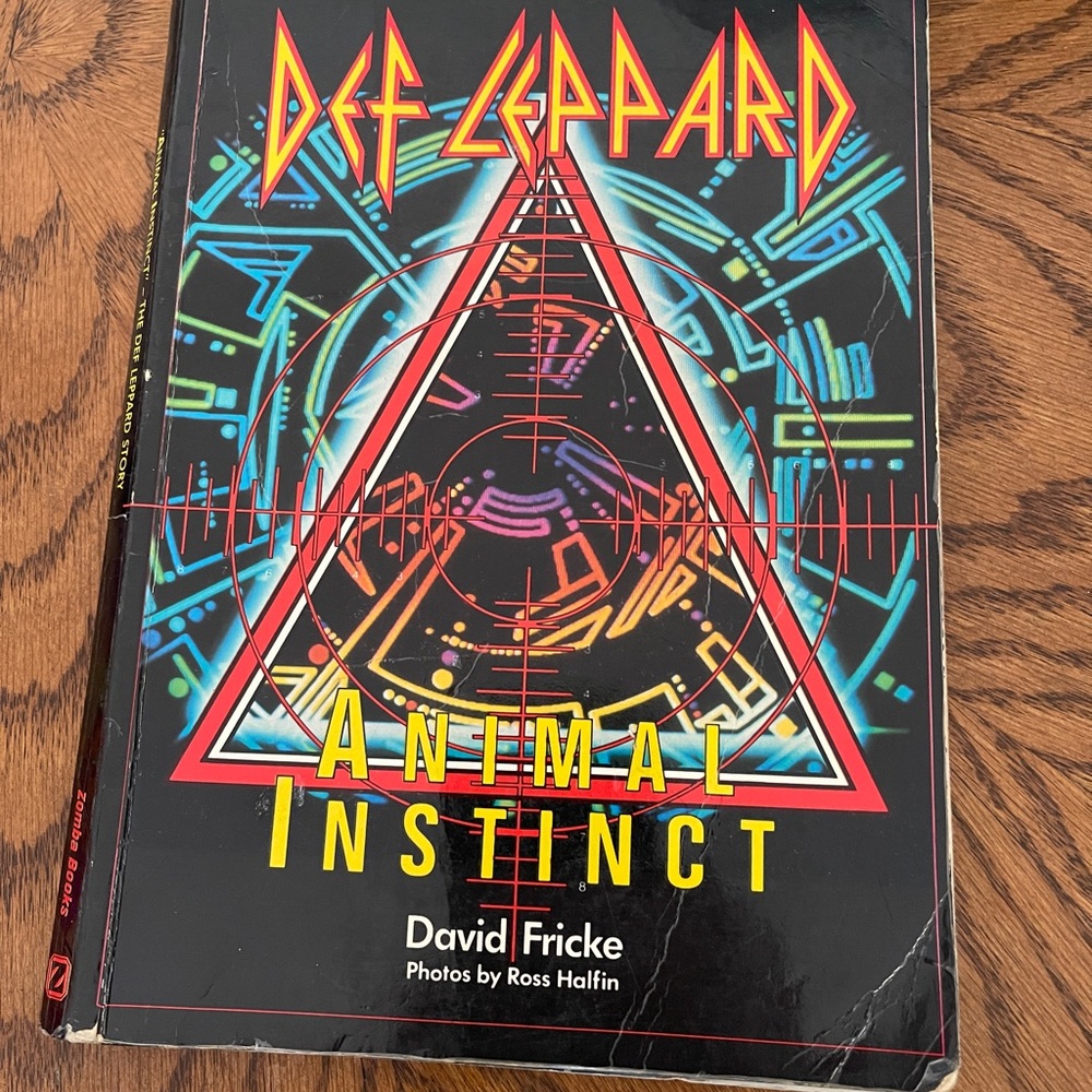 Def Leppard Animal Instinct Hardcover Book - Black with Multicolor Artwork